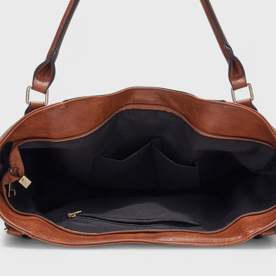 Nora. - Borsa elegante con frange