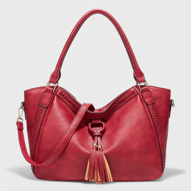 Nora. - Borsa elegante con frange