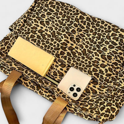 Nora. - Borsa a tracolla in tela con motivo leopardato