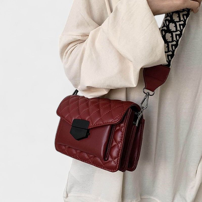 Nora. – Borsa a spalla classica con più scomparti