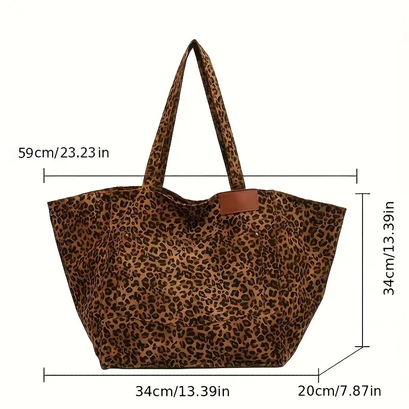 Nora. - Elegante borsa a tracolla con motivo leopardato