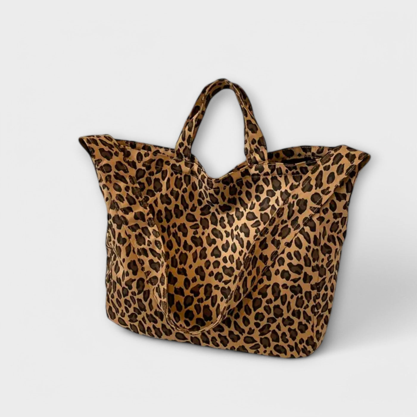 Nora. - Borsa alla moda con stampa leopardata