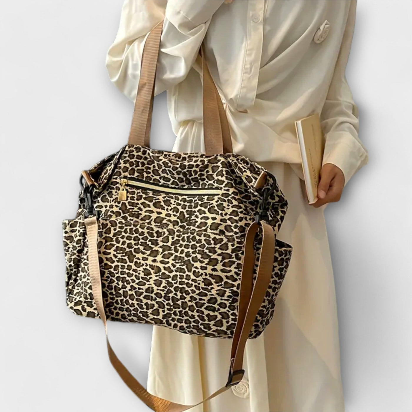 Nora. - Borsa a tracolla in tela con motivo leopardato