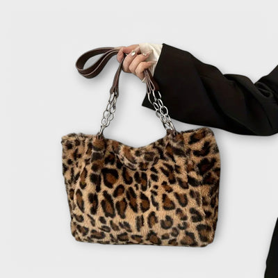 Nora. - Borsa a tracolla alla moda in morbida pelliccia sintetica con motivo leopardato